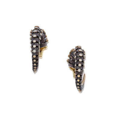 View full screen - View 1 of Lot 162. Pair of Silver, Gold and Diamond 'Horn' Earclips.