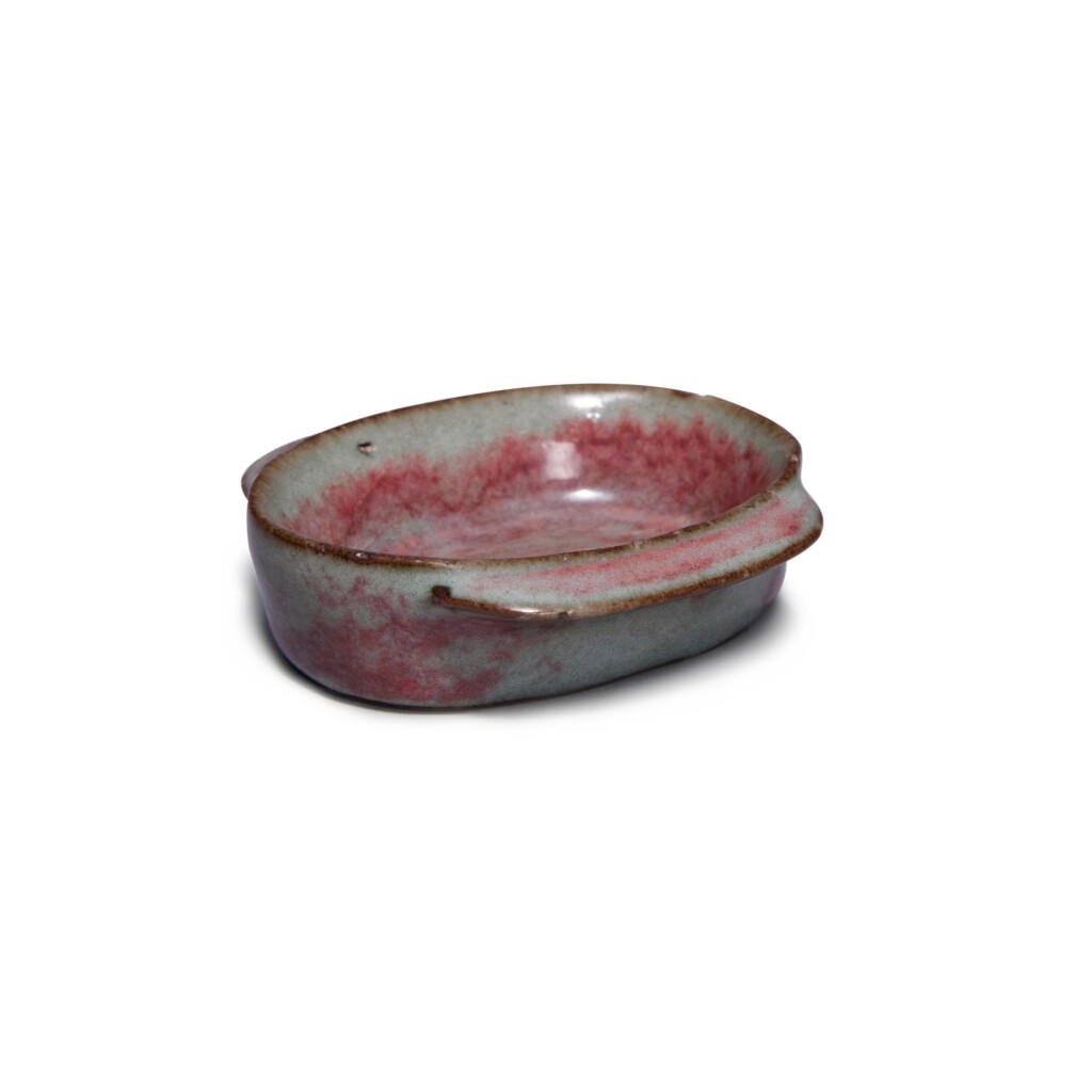 View full screen - View 1 of Lot 127. An unusual miniature 'Jun' ear cup, Northern Song - Yuan dynasty | 北宋至元 鈞窰天藍釉紫斑羽觴.