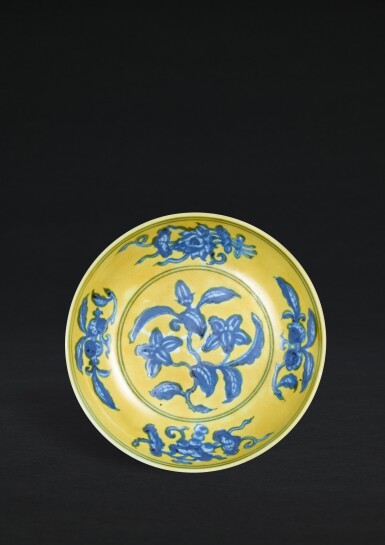 View full screen - View 1 of Lot 103. A rare yellow-ground underglaze-blue 'gardenia' dish, Mark and period of Zhengde | 明正德 黃地青花梔子花盤 《大明正德年製》款.