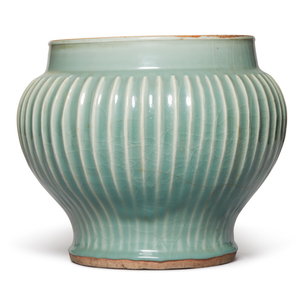View full screen - View 1 of Lot 852. A LARGE 'LONGQUAN' CELADON-GLAZED RIBBED BALUSTER JAR, LATE YUAN / EARLY MING DYNASTY.