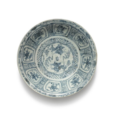 View full screen - View 1 of Lot 340. A Swatow blue and white 'dragon' dish, 16/17th century.