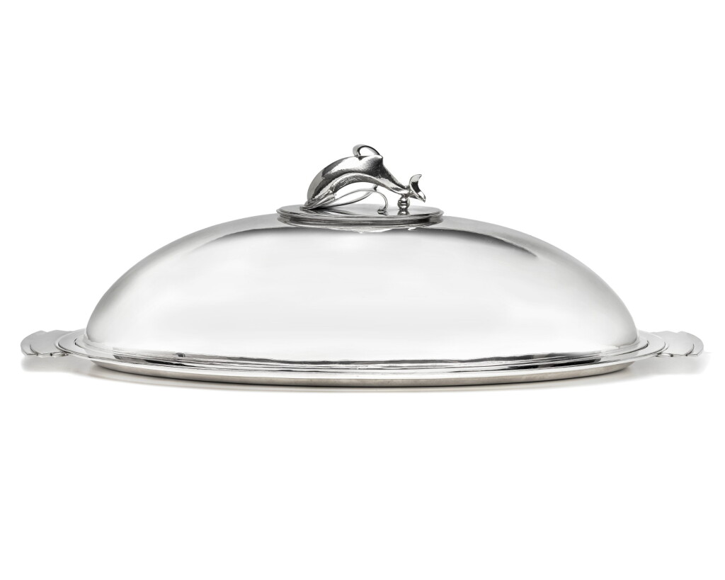 View full screen - View 1 of Lot 65. GEORG JENSEN | AN EARLY DANISH SILVER PLATTER, MAZARINE AND COVER, PYRAMID PATTERN NO. 600 B, DESIGNED BY HARALD NIELSEN, GEORG JENSEN, COPENHAGEN, 1933-1944.
