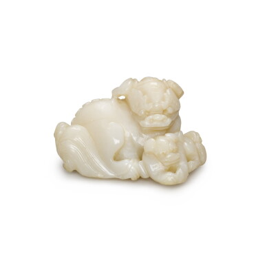 View full screen - View 1 of Lot 54. A small carved hardstone 'lion and cub' group | 硬石太獅少獅把件.