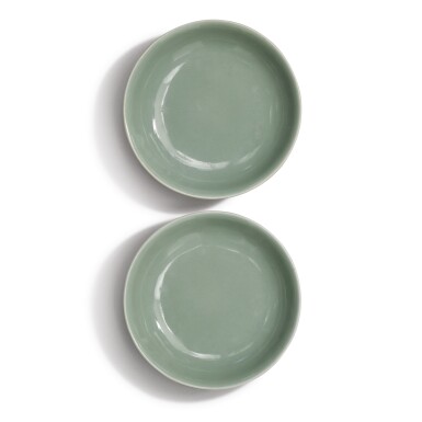 View full screen - View 1 of Lot 953. A PAIR OF SMALL CELADON-GLAZED DISHES, QING DYNASTY, 18TH / 19TH CENTURY.