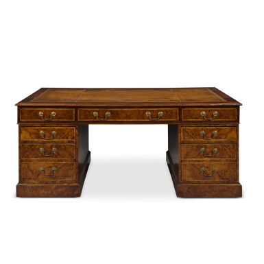 View full screen - View 1 of Lot 35. An Edwardian Gilt-Tooled Brown Leather Lined Walnut Pedestal Partner’s Desk, Circa 1900.