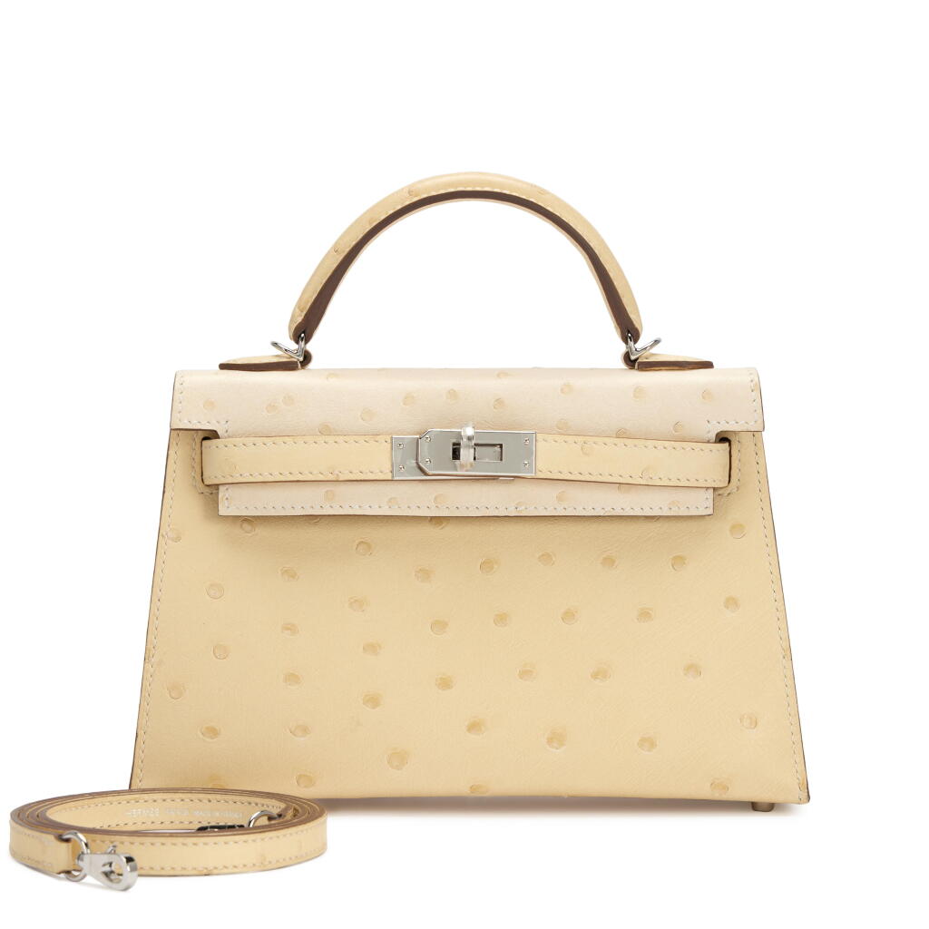 View full screen - View 1 of Lot 2. Limited Edition Vanille and Nata Ostrich Mini Kelly II 20 Palladium Hardware, 2024.