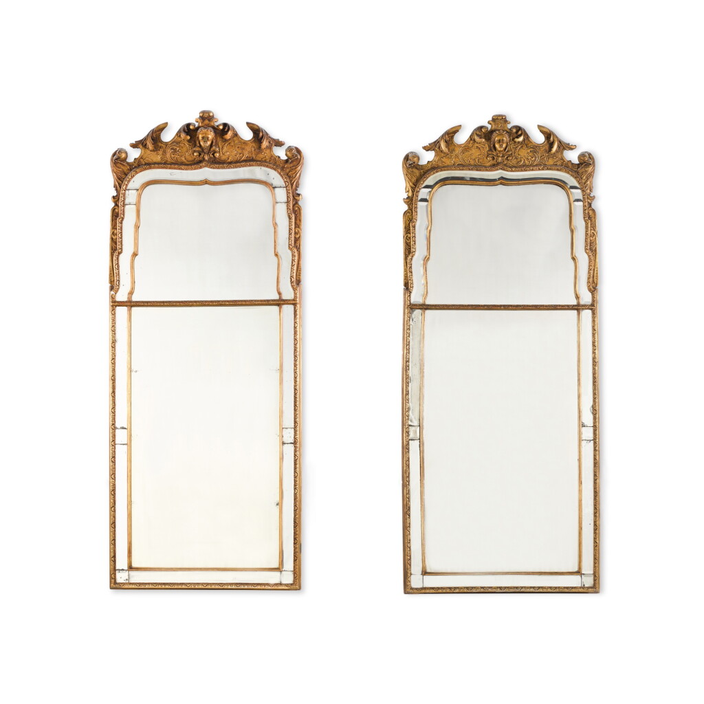 View full screen - View 1 of Lot 104. A pair of Queen Anne style giltwood pier glasses, 19th century.