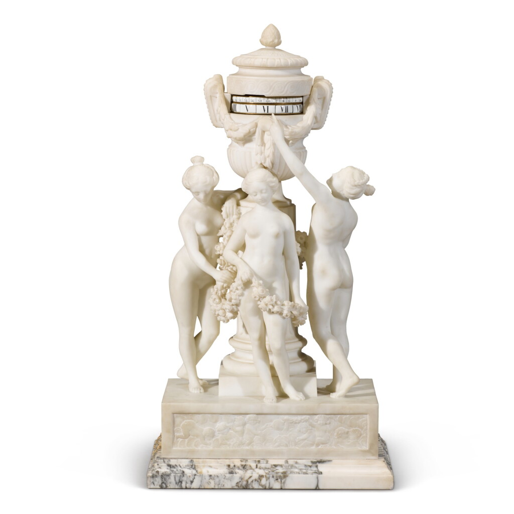 View full screen - View 1 of Lot 182. A Louis XVI-style white marble sculptural 'cercles tournants' clock after Falconet, French, circa 1910.