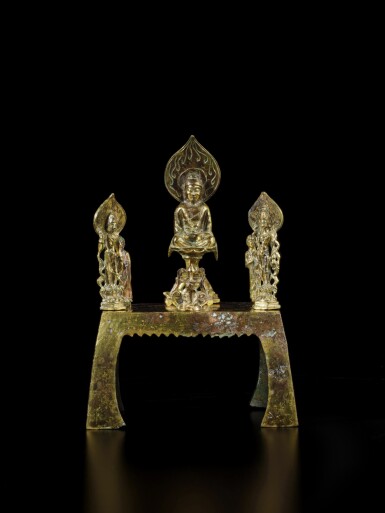 View full screen - View 1 of Lot 680. An extremely rare gilt-bronze Amitabha triad altarpiece, Tang dynasty, dated Zongzhang 2nd year, corresponding to 669 | .