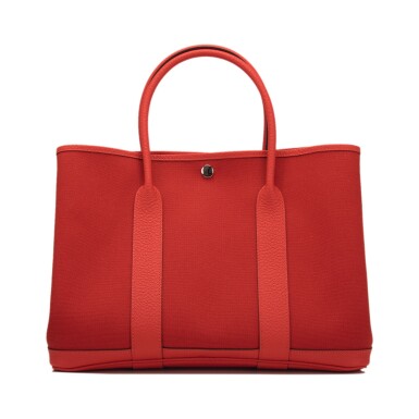 View full screen - View 1 of Lot 84. Hermès Rouge Tomate and Capucine Garden Party 36cm of Canvas and Country Cowhide with Palladium Hardware.