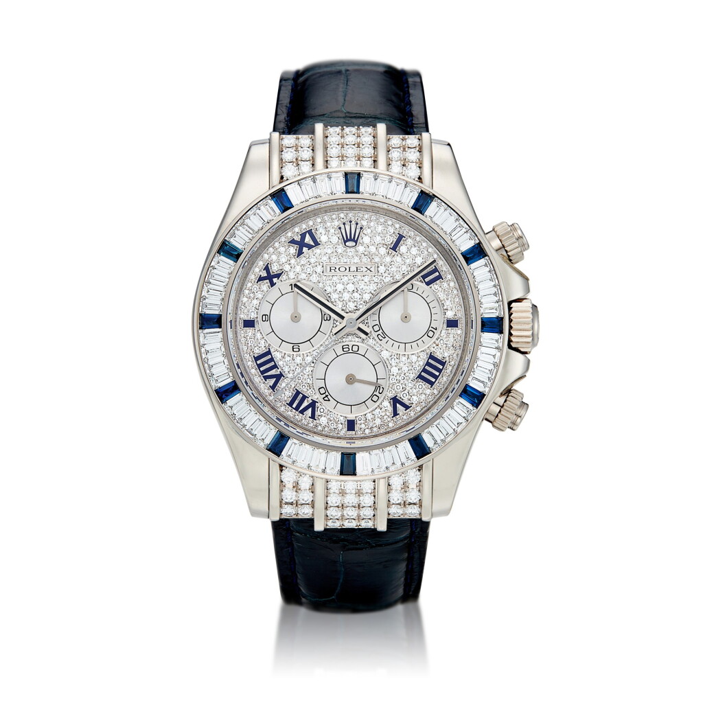 View full screen - View 1 of Lot 8144. Cosmograph Daytona, Reference 116599 | A white gold, diamond and sapphire-set chronograph wristwatch, Circa 2005 | 勞力士 | Cosmograph Daytona 型號116599 | 白金鑲鑽石及藍寶石計時腕錶,約2005年製.