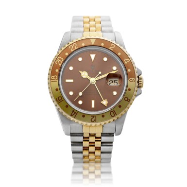View full screen - View 1 of Lot 8248. GMT-Master II, Reference 16713 | A yellow gold and stainless steel dual time zone wristwatch with date and bracelet, Circa 1991 | 勞力士 GMT-Master II 型號16713 | 黃金及精鋼兩地時間鏈帶腕錶,備日期顯示,約1991年製.