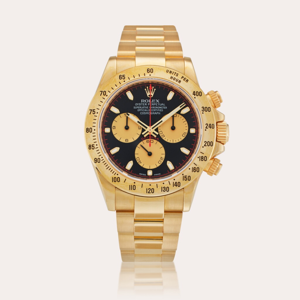 View full screen - View 1 of Lot 6. Reference 116528 Daytona | A yellow gold automatic chronograph wristwatch with bracelet, Circa 2010.