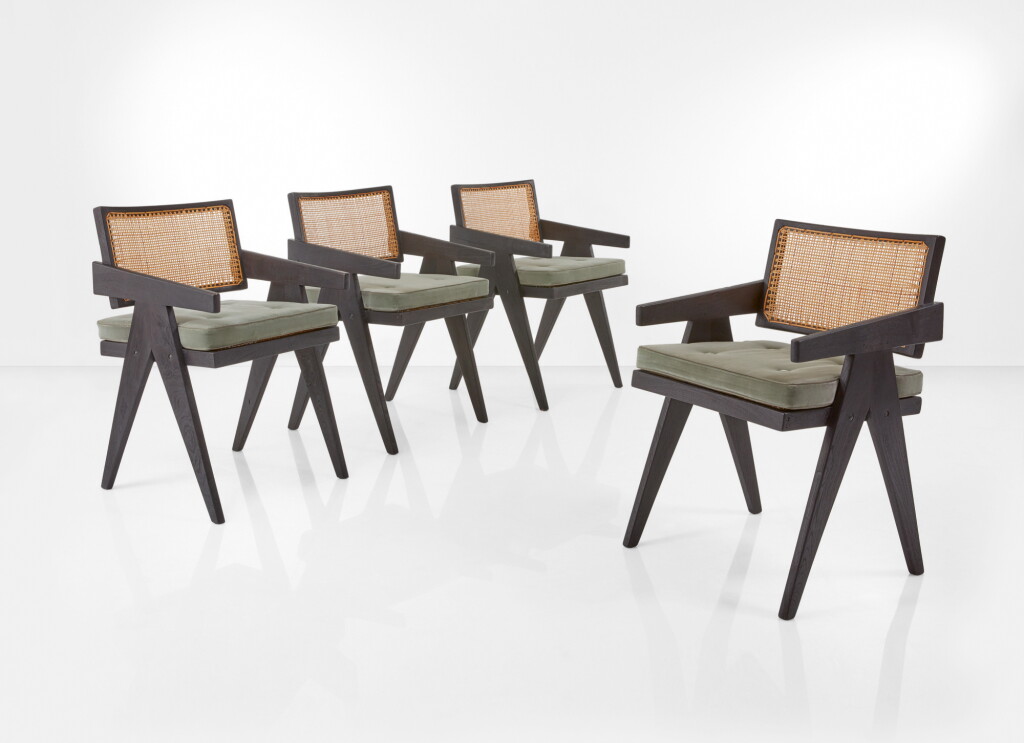 View full screen - View 1 of Lot 87. PIERRE JEANNERET | SET OF FOUR "OFFICE" ARMCHAIRS, MODEL NO. PJ-SI-28-A.