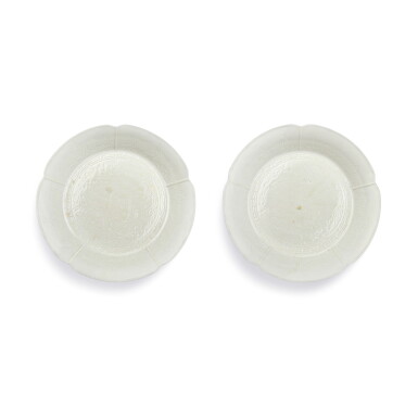 View full screen - View 1 of Lot 3709. A rare pair of small Dingyao-imitation lobed dishes, Seal marks and period of Yongzheng | 清雍正 仿定釉暗雲龍紋梅花式盤一對 《雍正年製》款.