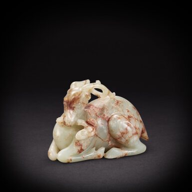 View full screen - View 1 of Lot 6890. A pale celadon and russet jade 'deer' paper weight, Qing dynasty, 17th - 18th century | 清十七至十八世紀 青玉臥鹿銜芝鎮紙.