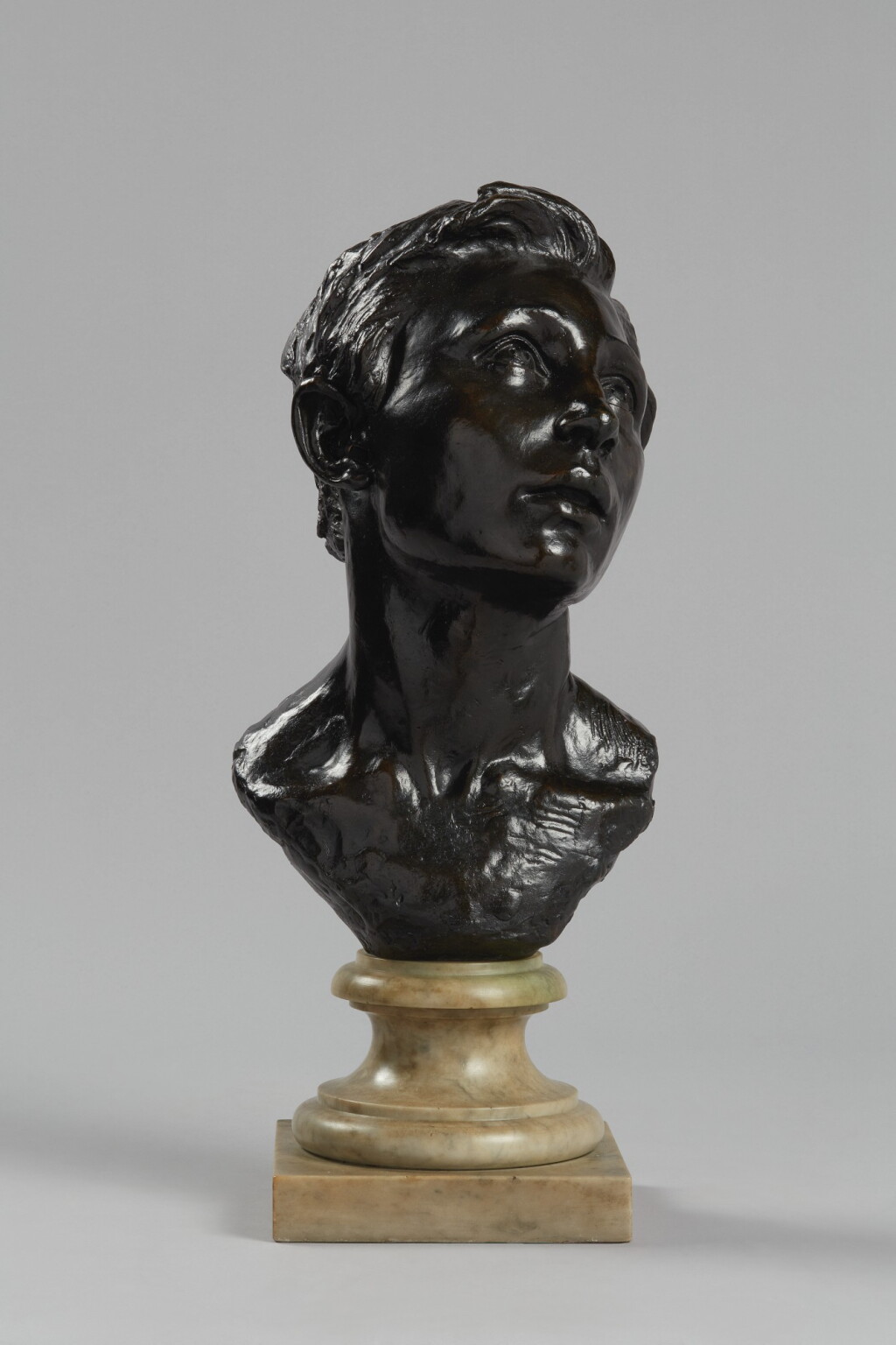 View full screen - View 1 of Lot 123. JULES DALOU | PORTRAIT BUST OF A YOUNG MAN.