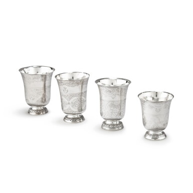 View full screen - View 1 of Lot 447. A group of four engraved silver beakers on ovolo moulded spreading foot, Paris, 18th century | Groupe de quatre timbales gravées en argent sur piédouche mouluré d'oves, Paris, XVIIIe siècle.