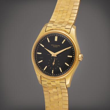 View full screen - View 1 of Lot 351. Reference 3428 | A yellow gold automatic wristwatch with black dial, Circa 1961.