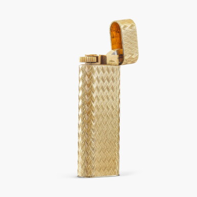 View full screen - View 1 of Lot 1243. Gold and Metal Lighter | 卡地亞 | 金 及 金屬 打火機.