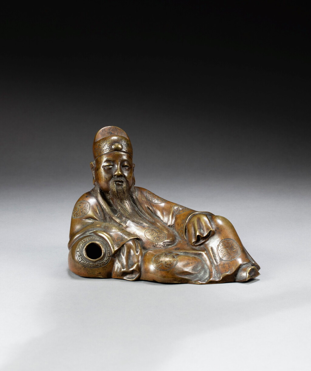 View full screen - View 1 of Lot 165. A bronze figure of poet Li Bai Qing dynasty, 17th-18th century | 清十七至十八世紀 銅鑄李白坐像.
