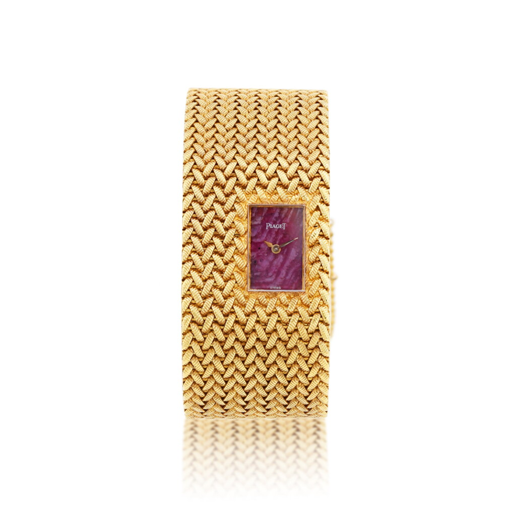 View full screen - View 1 of Lot 784. Piaget | Montre bracelet de dame racine de rubis et or | Lady's ruby stone and gold bracelet.