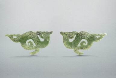View full screen - View 1 of Lot 729. A pair of celadon jade 'S-dragon' pendants, Eastern Zhou dynasty, Warring States period | 東周戰國 青玉龍形珮一對.