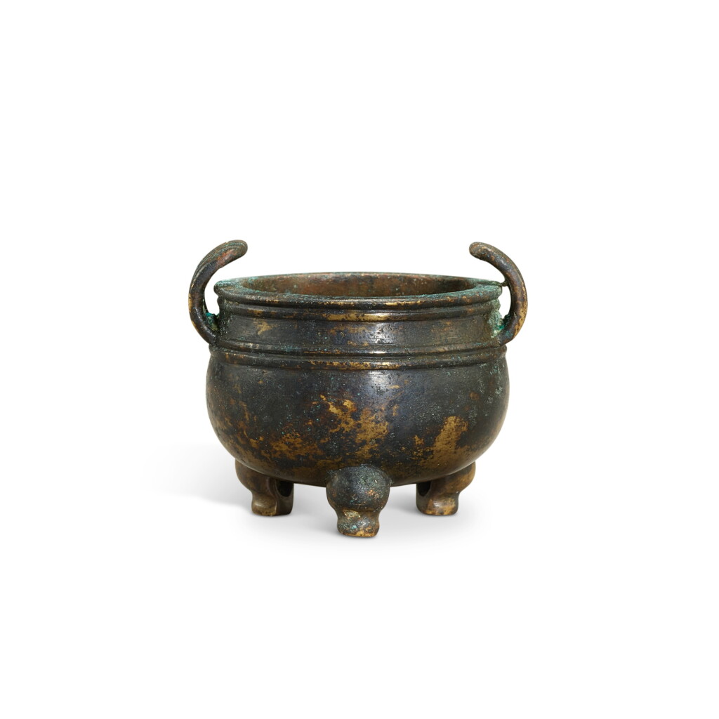 View full screen - View 1 of Lot 5898. A small bronze tripod incense burner, Qing dynasty, 17th century | 清十七世紀 銅鼎式小爐.