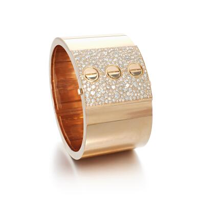 View full screen - View 1 of Lot 516. Gold and diamond bangle, 'Love'.