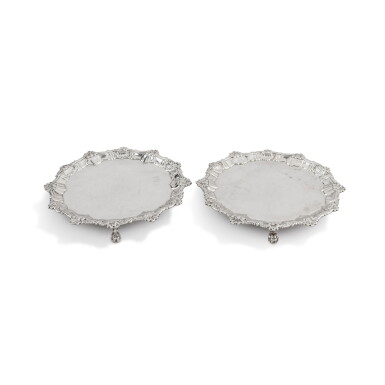 View full screen - View 1 of Lot 824. Two George II silver matching pair of waiters, one by Ebenezer Coker and Thomas Hanam, one by Ebenezer Coker, London, 1759 and 1760.