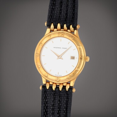 View full screen - View 1 of Lot 298. A yellow gold wristwatch with date | Circa 1985.