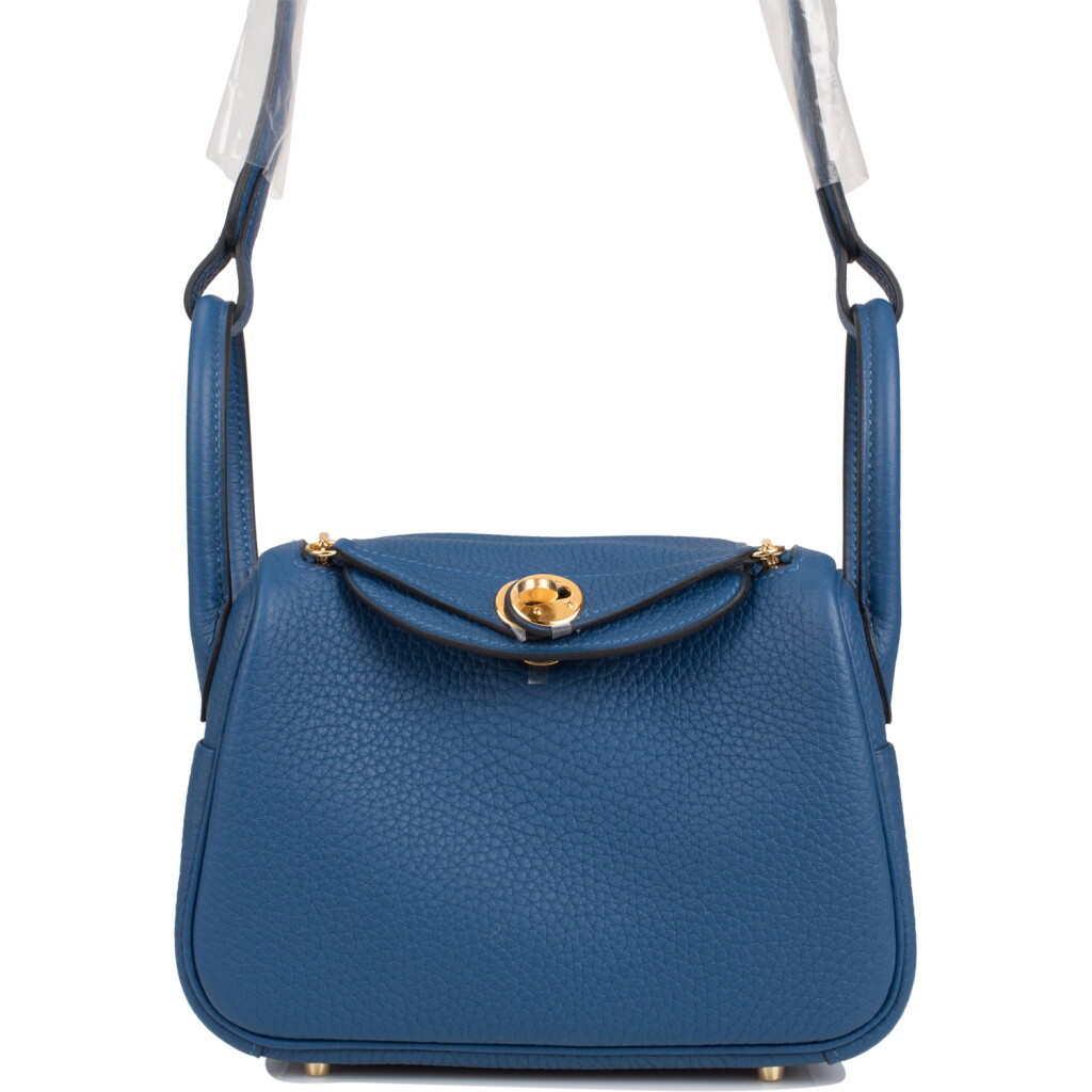 View full screen - View 1 of Lot 9. HERMÈS | DEEP BLUE MINI LINDY OF CLEMENCE LEATHER WITH GOLD HARDWARE.