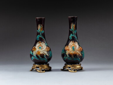 View full screen - View 1 of Lot 172. Two small fahua 'lotus' bottle vases, 16th-17th century, with 19th century ormulu mounts | 十六至十七世紀 琺華蓮紋長頸瓶兩件.