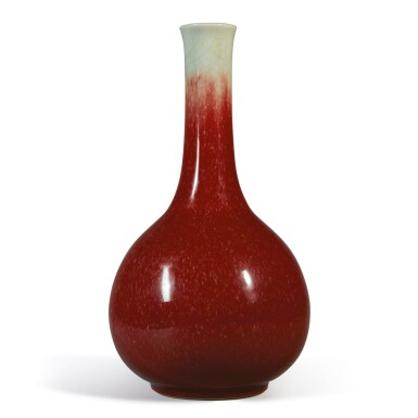 View full screen - View 1 of Lot 1017. A 'LANGYAO' COPPER-RED-GLAZED BOTTLE VASE, QING DYNASTY, 18TH / 19TH CENTURY.