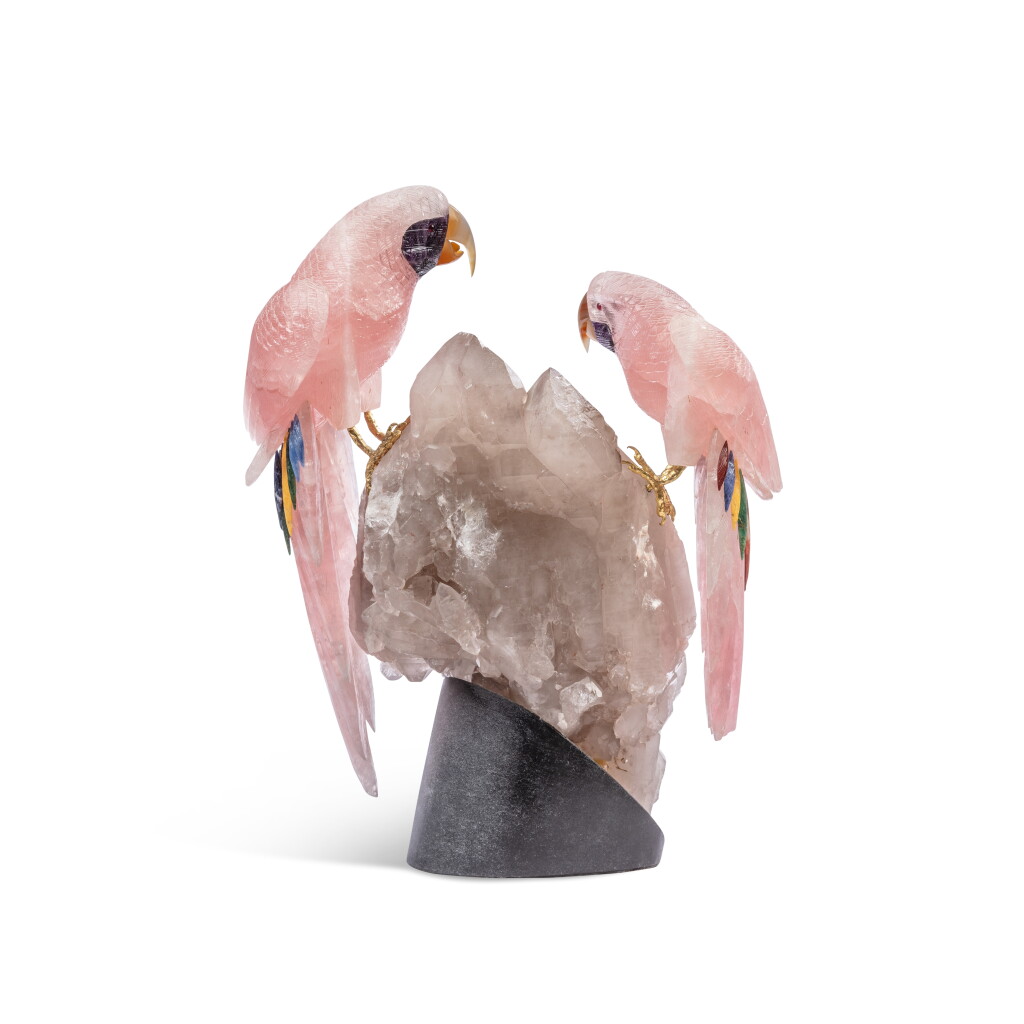 View full screen - View 1 of Lot 297. Two pink quartz, rock crystal, hardstones and gilt-metal parrots, the plinth signed Amsterdam Sauer, Rio de Janeiro, modern.