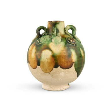 View full screen - View 1 of Lot 174. A miniature sancai-glazed pottery jar, Tang dynasty | 唐 三彩貼花四繫小罐.