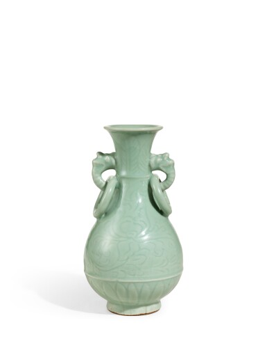 View full screen - View 1 of Lot 2018. An heirloom Longquan celadon 'peony' handled vase, Ming dynasty | 明 龍泉青釉刻牡丹紋獸耳銜環瓶.