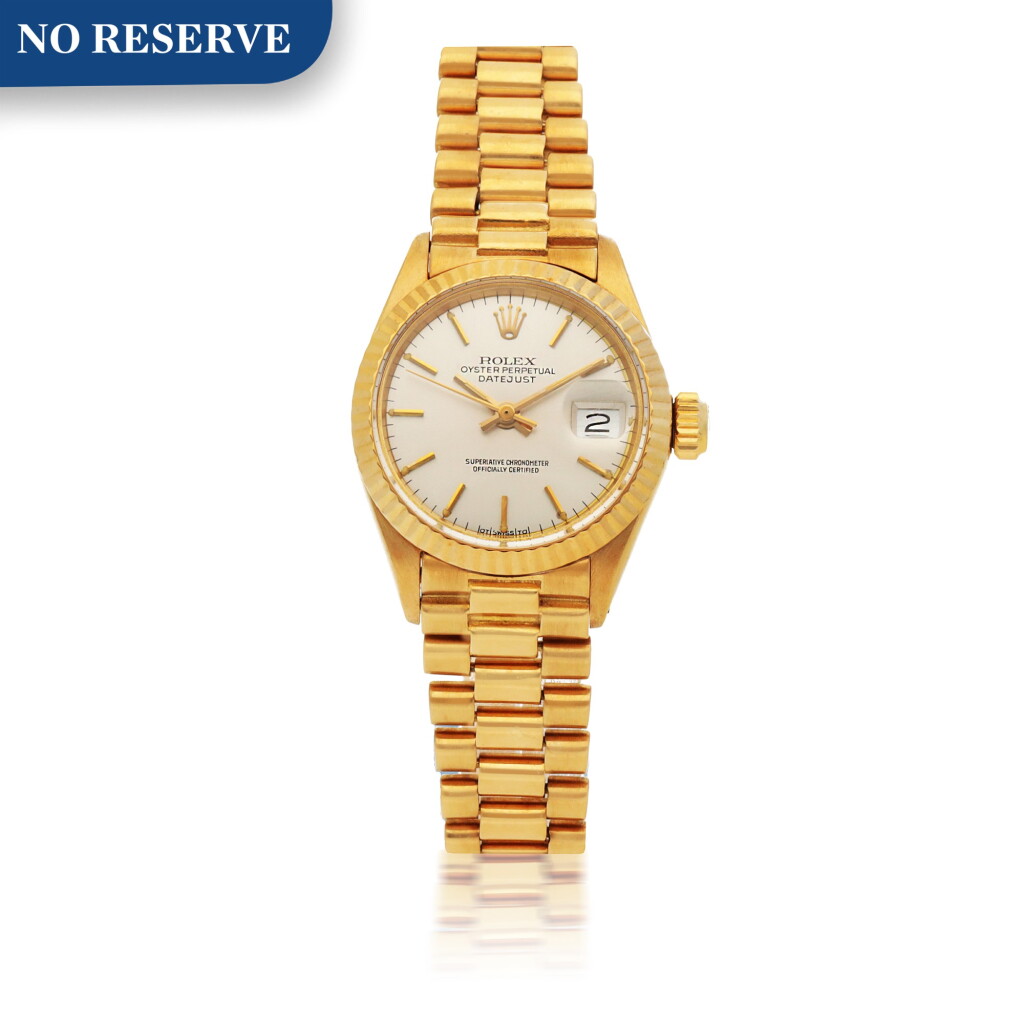 View full screen - View 1 of Lot 909. ROLEX | DATEJUST, REF 6917 YELLOW GOLD WRISTWATCH WITH DATE AND BRACELET CIRCA 1973.