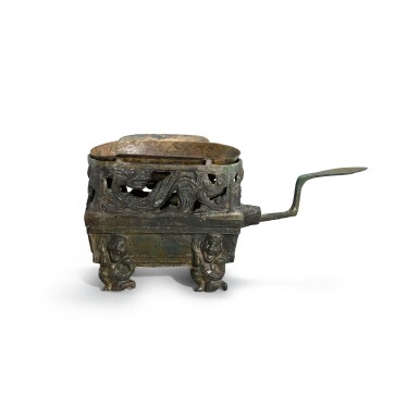 View full screen - View 1 of Lot 1053. A set of bronze sauce ear cup and openwork 'mythical beasts' brazier, ranlu, Western Han dynasty | 西漢 青銅四象染爐及耳盃.