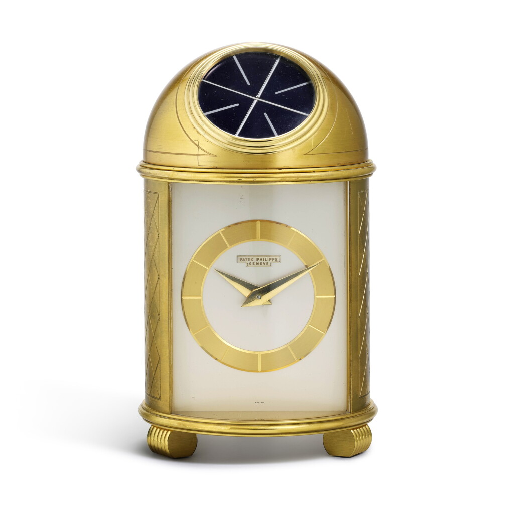 View full screen - View 1 of Lot 306. PATEK PHILIPPE | PENDULETTE DÔME REFERENCE 701, GILT BRASS TIMEPIECE, MADE IN 1957.