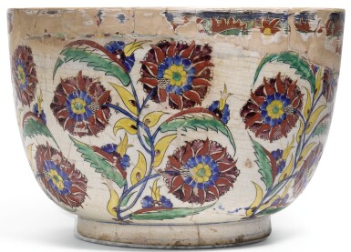 View full screen - View 1 of Lot 283. AN EXCEPTIONALLY LARGE KUTAHYA POLYCHROME POTTERY BOWL, TURKEY, MID-18TH CENTURY.