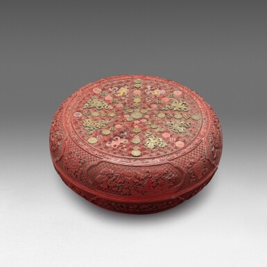 View full screen - View 1 of Lot 189. A large cinnabar lacquer bronze inlaid 'eight treasures' box and cover Qing dynasty, Qianlong - Jiaqing period | 清乾隆至嘉慶 剔紅嵌銅暗八仙紋圓蓋盒.