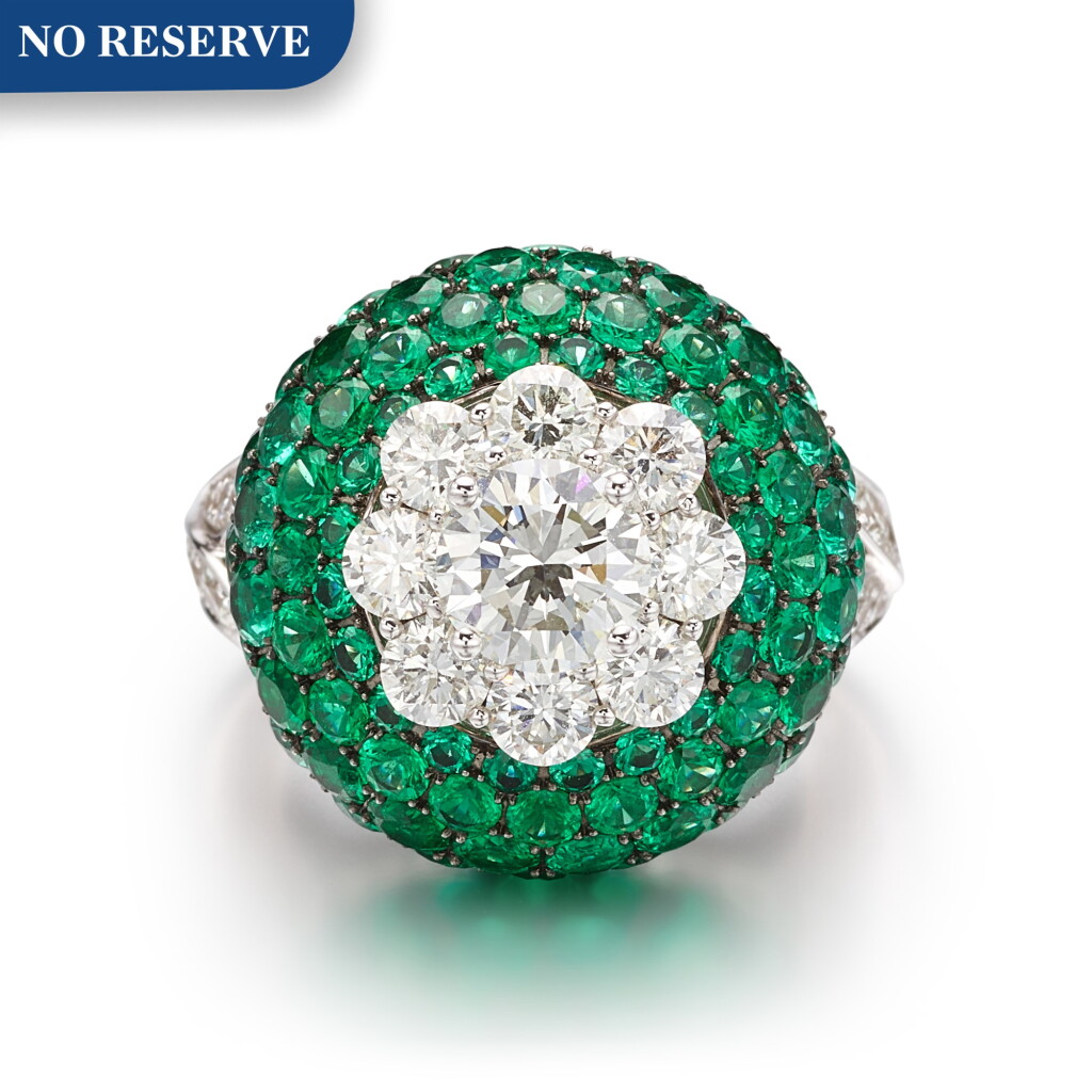 View full screen - View 1 of Lot 1054. 'Cluster Halo' Emerald and Diamond Ring | 格拉夫| 'Cluster Halo' 1.02克拉 圓形 G色 鑽石 配 祖母綠 戒指 (小鑽石及祖母綠共重約3.20及5.40克拉).
