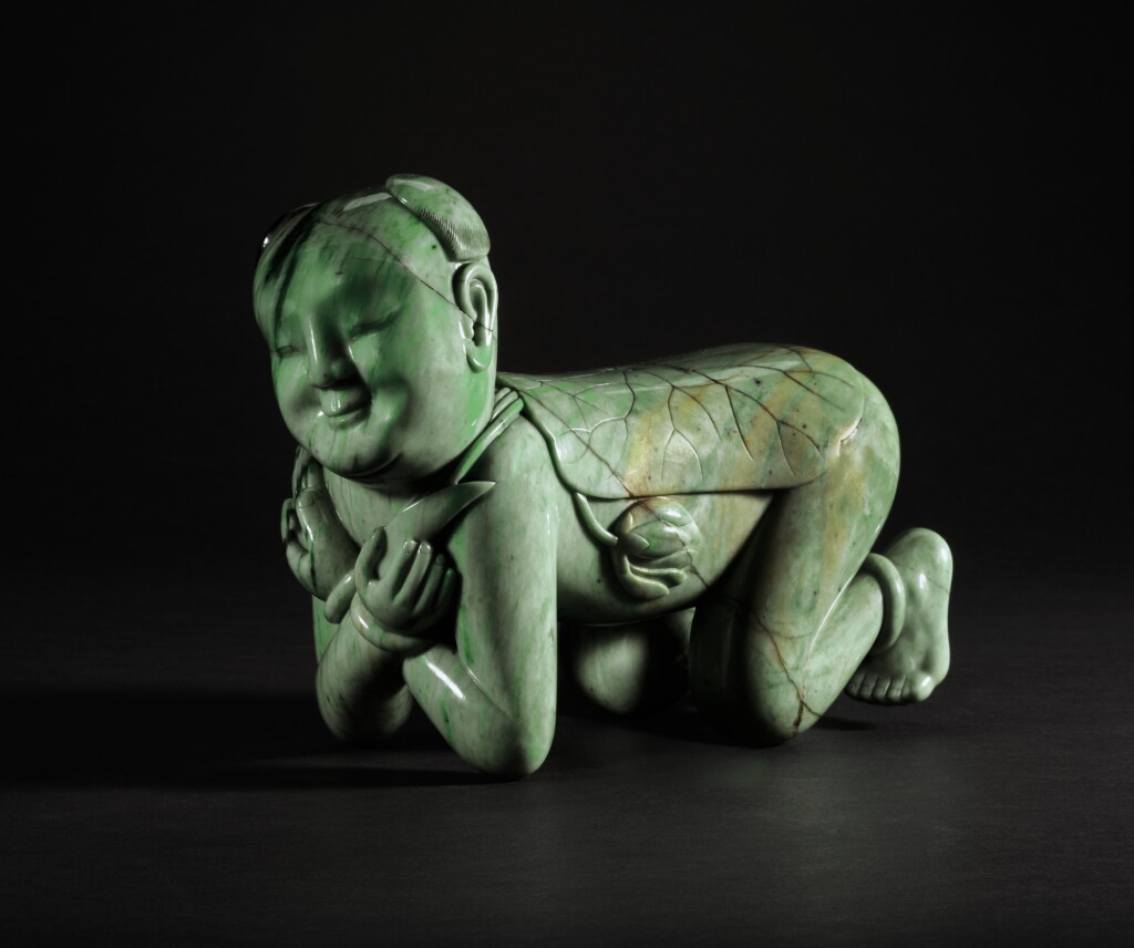 Voir en plein écran - Voir 1 du lot 126. A RARE LARGE JADEITE 'BOY' HEADREST QING DYNASTY | 清 翠玉雕連生貴子枕.