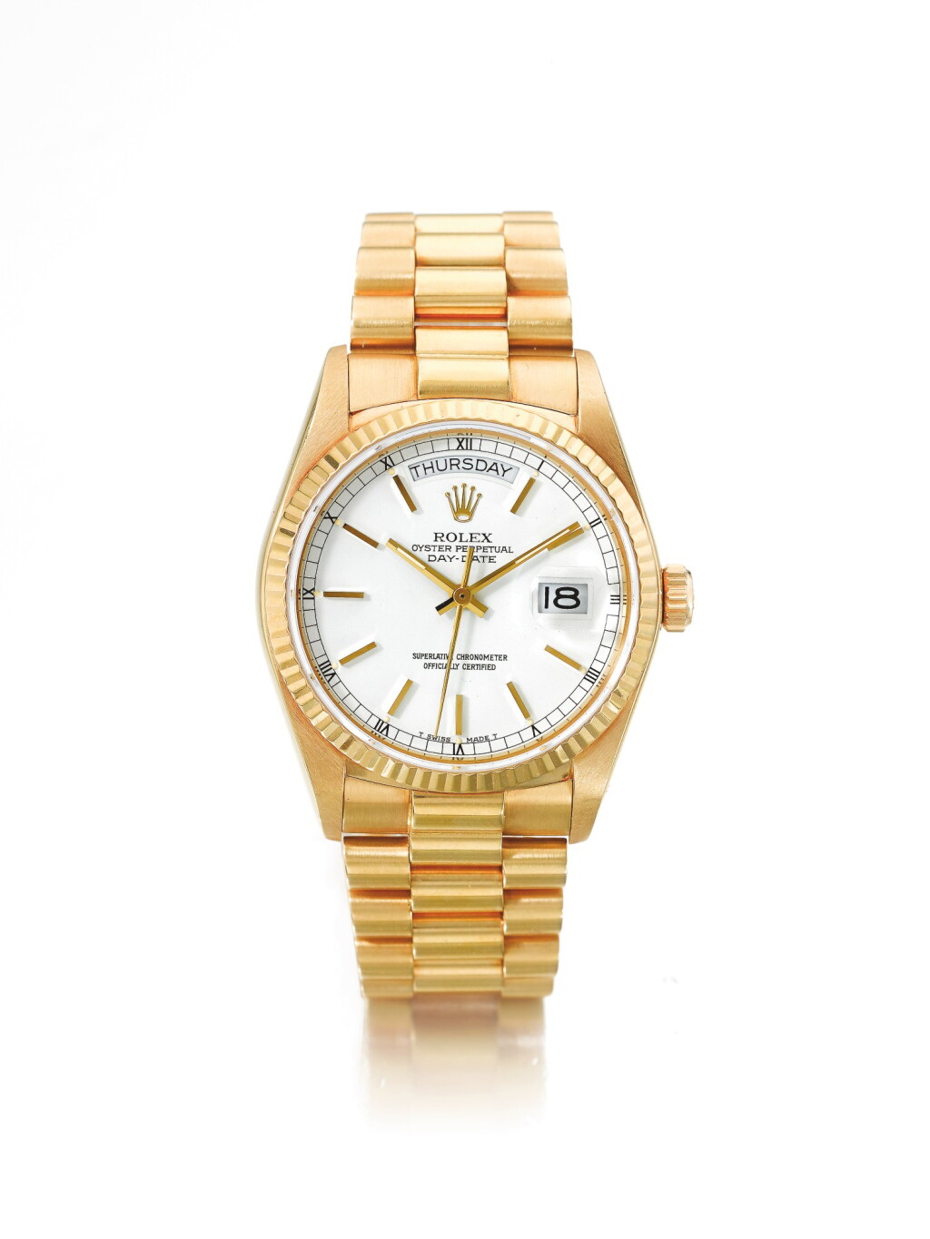 View full screen - View 1 of Lot 64. ROLEX | REF 18038/18000 DAY-DATE, A YELLOW GOLD AUTOMATIC CENTER SECONDS WRISTWATCH WITH DAY, DATE, AND BRACELET CIRCA 1984.