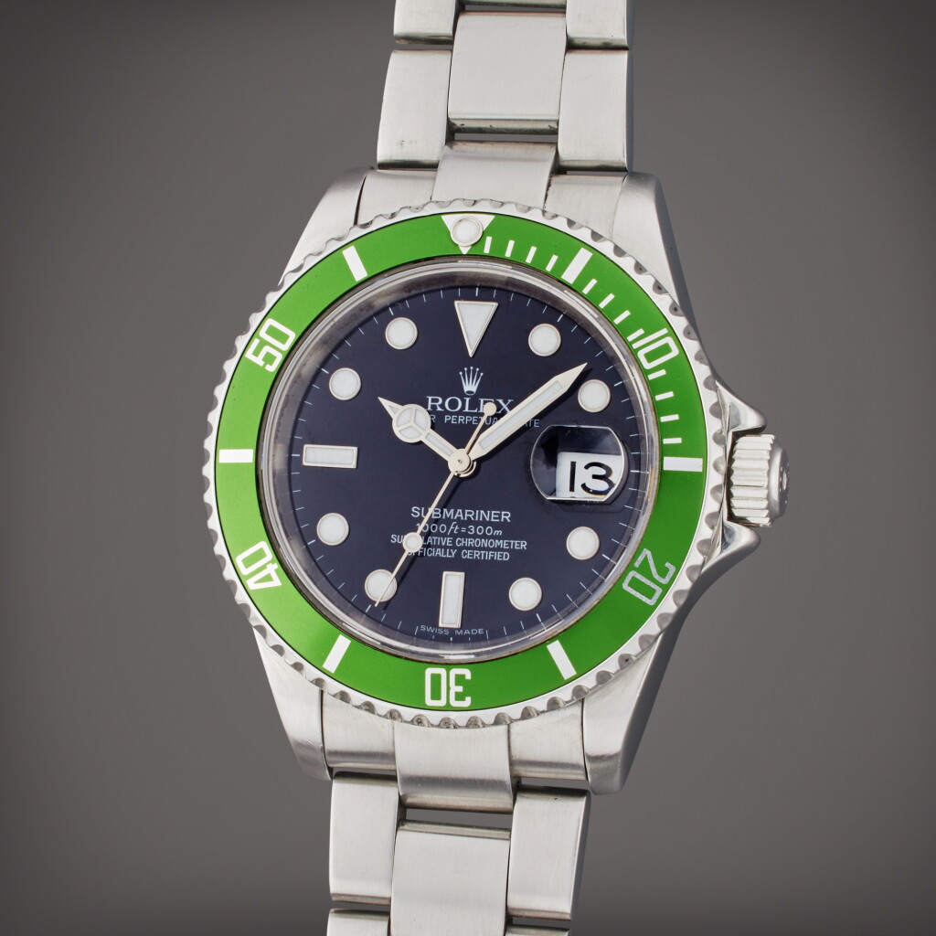 View full screen - View 1 of Lot 107. Reference 16610V Submariner 'Kermit' | A stainless steel automatic wristwatch with date and bracelet, Circa 2007.