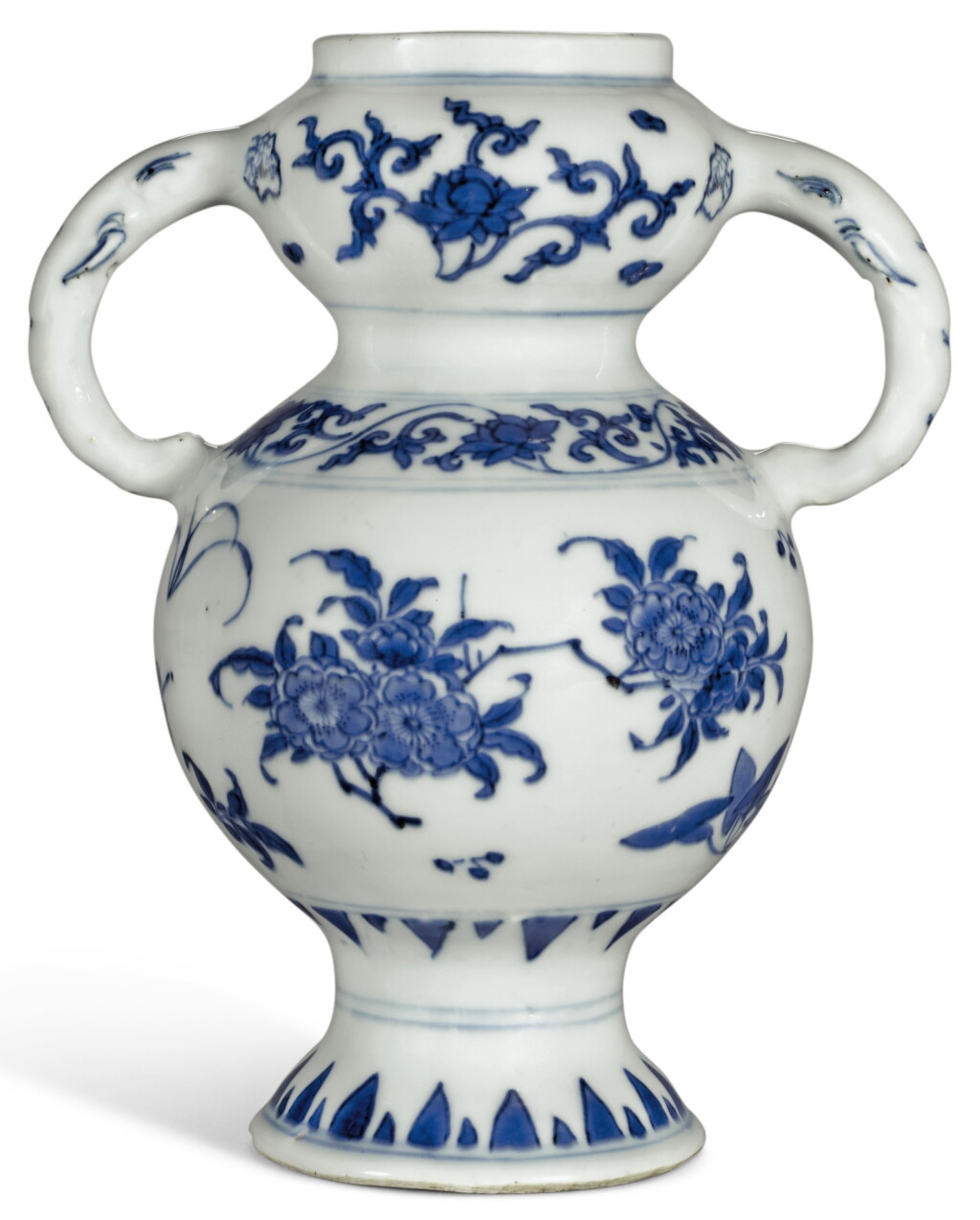 View full screen - View 1 of Lot 328. A BLUE AND WHITE ELEPHANT-HANDLED VASE TRANSITIONAL PERIOD | 明末清初 青花花卉紋象耳瓶.
