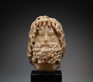 View full screen - View 1 of Lot 220. A Roman Alabaster Head of Sarapis, circa 2nd century A.D..