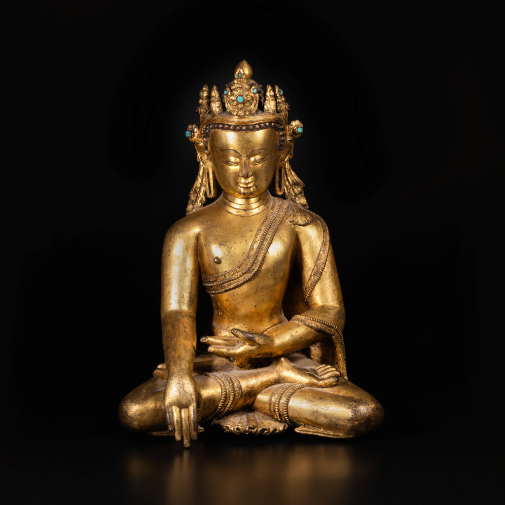 View full screen - View 1 of Lot 568. A large gilt copper alloy figure of Shakyamuni Buddha, Nepal, circa 14th century.