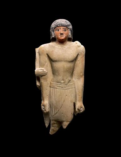 View full screen - View 1 of Lot 267. AN EGYPTIAN LIMESTONE FIGURE OF A MAN, 5TH DYNASTY, 2520-2360 B.C..